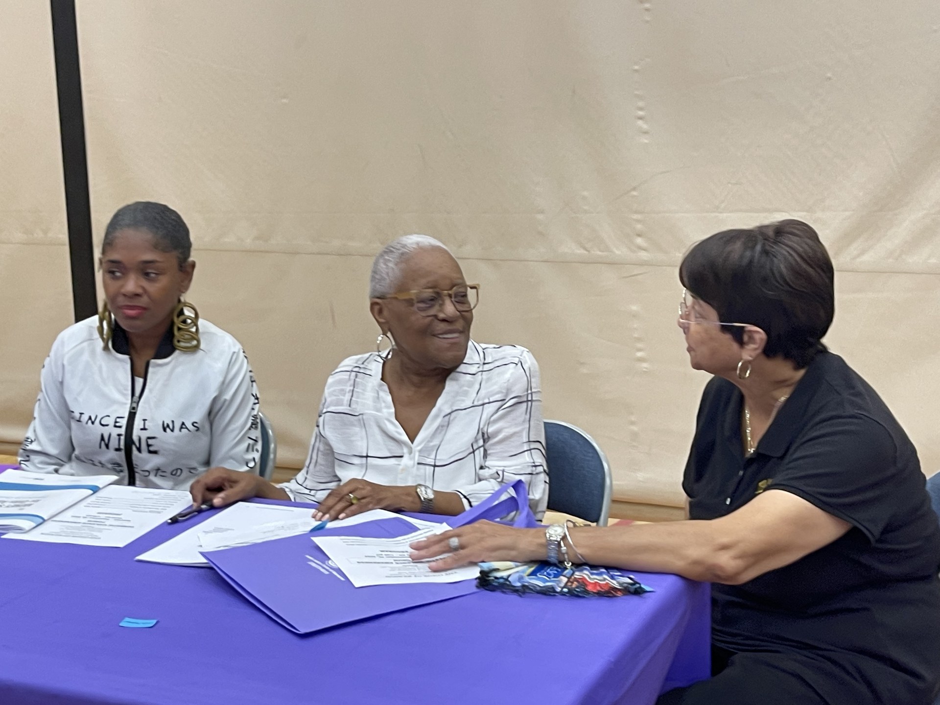 At a domestic-violence awareness forum